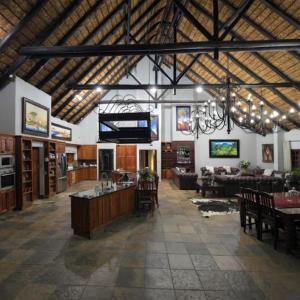 a large room with a living room and a kitchen at Sable Mountain in Hekpoort