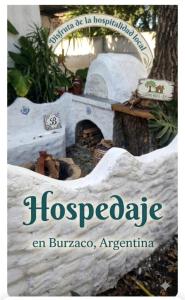 a book about a house made out of igoco at Amanecer Campestre bajo el Ceibo in Burzaco +3 photos
