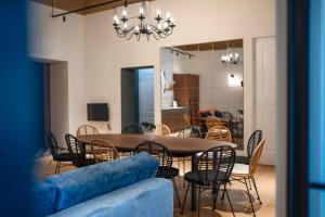 a dining room with a table and chairs at Slawkowska No 6 Residence in Krakow