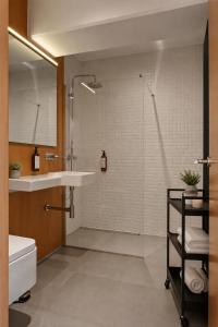 a bathroom with a shower and a sink at RHUM B03 - Dome View in Bucharest