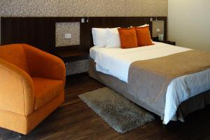 Postel nebo postele na pokoji v ubytování Quality Hotel Curitiba