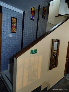 a staircase in a building with stained glass windows at CONFORT Room AIRE AC - Desayuno - Tv - Baño Compartido - Excelente Ubicación Muelle Cruceros - Exquisita Atención y Buen Ambiente in Cartagena de Indias