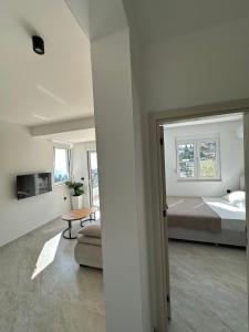 Krevet ili kreveti u jedinici u okviru objekta Kaskada Apartments Ulcinj