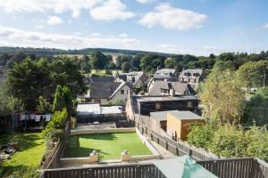 an aerial view of a house with a yard at Superhost House Brechin sleeps 6, 3 bedrooms in Brechin