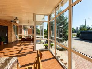 an open living room with large windows at Готель Українське in Vinnytsya +5 photos