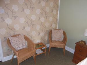 A seating area at Warrington Guest House 