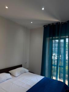 Llit o llits en una habitació de La Rosa