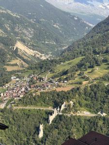 an aerial view of a village in a valley at Appartement Grande Dixence - Hérémence in Hérémence +5 photos