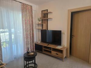 Televisor o centre d'entreteniment de Green Almond Garden Apartments