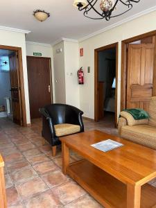a living room with a coffee table and a couch at Remoña 2 in Espinama