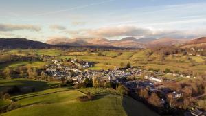 an aerial view of a town in the hills at 1 Bed in Hawkshead oc-lr072 in Hawkshead