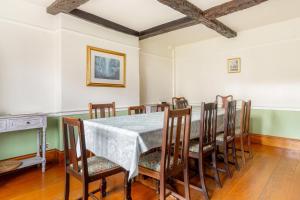 a dining room with a table and chairs at 5 Bed in Hawkshead oc-lr134 in Hawkshead