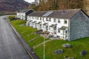 an aerial view of a building on the side of a road at 2 Bed in Ambleside oc-lr114 in Chapel Stile