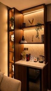 a kitchen with a counter with plants on it at Advantage Residence in Medina