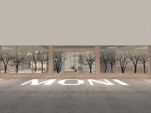 an empty parking lot in front of a building at MONI hotel in Atsugi