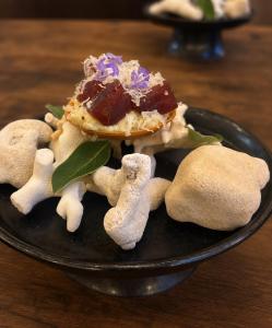 a plate of food with a dessert on top at WAAP Hotel in Ishigaki Island