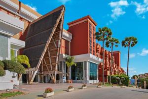 a rendering of a building with a wooden structure at Holiday World Polynesia, Affiliated by Meliá in Benalmádena