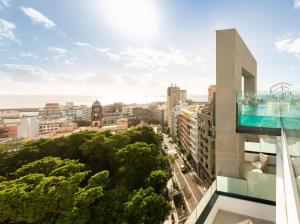 a view of a city from a building at INNSiDE by Meliá Tenerife Santa Cruz in Santa Cruz de Tenerife
