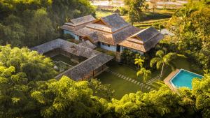 an aerial view of a house in the forest at Pa Sak Tong in Chiang Rai