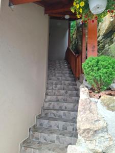 a set of stone stairs leading up to a house at Studio Niki in Smolyan
