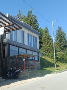 a building on the side of a road at Mountain Relax Vlašić in Vlasic