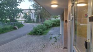 an outside window of a building with a street at Cosy room in Oslo +5 photos