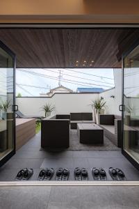 a view of a living room from inside a house at ResoLife in Kochi +33 photos
