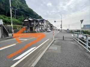an empty street with houses and cars on it at NouHarborVilla in Itoigawa +13 photos