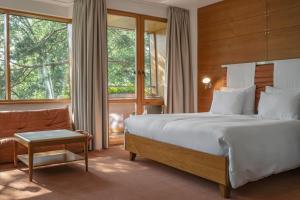 a bedroom with a large bed and a window at Palanga Life Balance SPA Hotel in Palanga