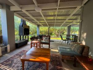 a living room with a couch and a table at Fossil Hills in McGregor