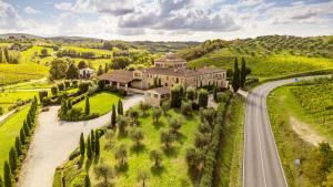 an aerial view of a mansion in the middle of a road at Tenuta Santavenere in San Bartolomeo