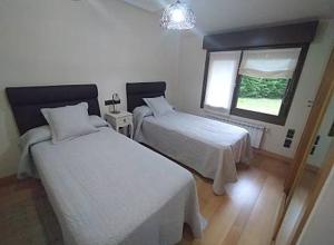Llit o llits en una habitació de Casa Sofia