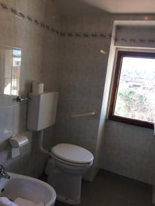 Koupelna v ubytování Hotel Bodoni