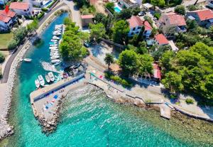 an aerial view of a marina with boats in the water at Apartmani Matjačić - Ugljan in Ugljan