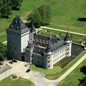 an aerial view of a castle with a tower at Ardennes Woods in Marche-en-Famenne