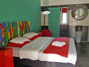 Postel nebo postele na pokoji v ubytování Hôtel Ascosa Aventure