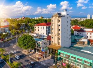 an overhead view of a city with a building at Le Centre Pleiku Hotel in Pleiku