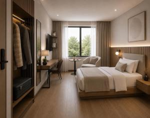 a bedroom with a bed and a desk and a window at Hotel Altes Sudhaus in Kassel