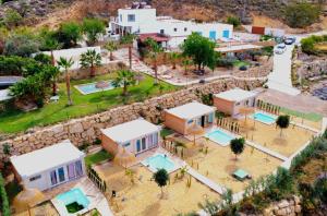 an aerial view of a resort with a pool at B&B La Nava Suites in Mojácar