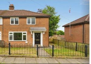 a brick house with a fence in front of it at Newly Refurbished 3-Bed Sleeps 5 in Lostock