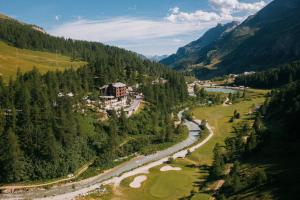 an aerial view of a valley with a river at Chalet Valdotain in Breuil-Cervinia