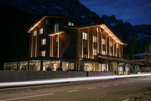 a building on a street at night at Chalet Valdotain in Breuil-Cervinia