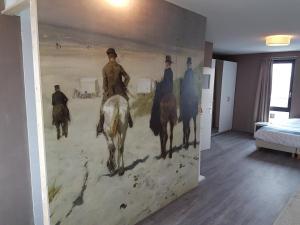 Postel nebo postele na pokoji v ubytování B&B Beach Inn