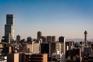 a view of a city with tall buildings at ESLEAD HOTEL Namba East in Osaka