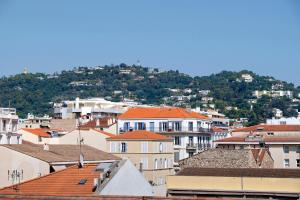 a view of a city with houses and roofs at Studio Centre Cannes, Rue d’Antibes in Cannes