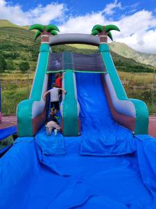a group of people riding on a inflatable play structure at Hotel Taüll in Pla de l'Ermita
