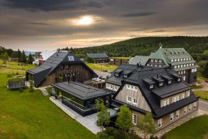 an aerial view of a large building with a house at Chata Jeřabinka in Horní Malá Úpa