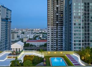 a view of a city with tall buildings at The Victory Residences Bangkok in Bangkok