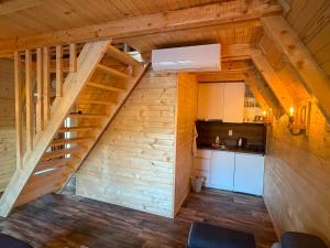 an overhead view of a kitchen in a tiny house at Brvnare Sadba 