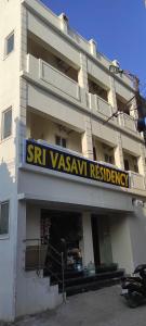 a building with a sign for a st vyssiya restaurant at Hotel vasaavi Rameswaram in Rāmeswaram